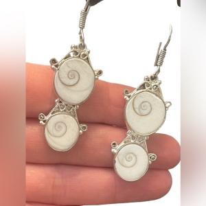 Fancy silver finish Indonesian shiva eye shell dangle earrings