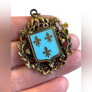 Mid Century Fleur de lis and Shield Goldtone and blue Enamel pendant