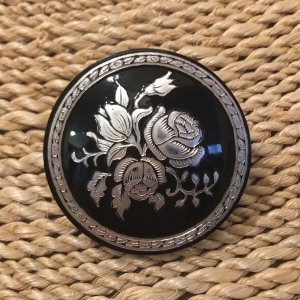 Victorian resin and silver round flower brooch