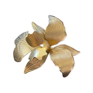 Vintage etched gold plated orchid brooch