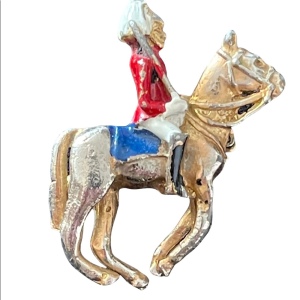 Vintage British soldier riding horse brooch