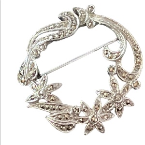 Silver finish fancy marcasite wreath brooch