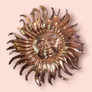 Gold tone heavy SUN brooch