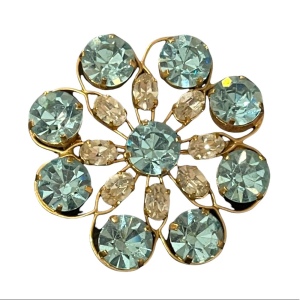 Vintage appx 1950s blue & clear crystal gold finish flower brooch