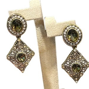 Retired Heidi Daus antiqued brassy finish peridot green & clear crystal earrings