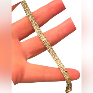 Lovely sterling silver 925 gold plt Diamond illusion tennis bracelet