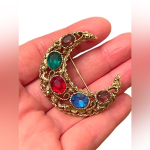 Vintage 1980s gold finish colorful rhinestone Crescent brooch