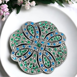 Fancy swirl blue green crystal brooch