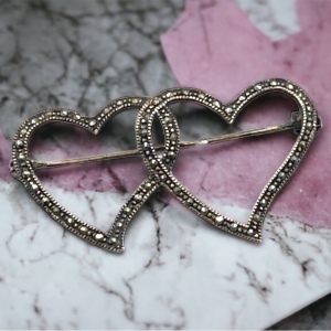 Vintage sterling silver marcasite two hearts brooch