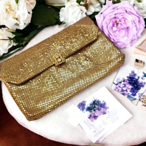 - Vintage Whiting & Davis gold mesh clutch purse