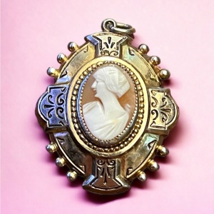 Vintage ornate etched gold and silver finish Shell cameo locket pendant