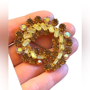 Vintage amber & pale yellow gold finish swirl crystal brooch