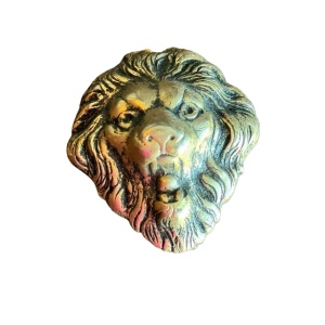 Vintage small brassy lions head brooch