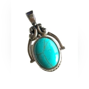 Silver finish southwestern style double side faux turquoise pendant