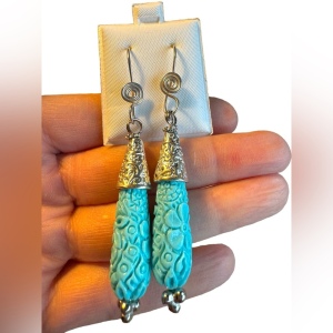 Lovely ornate Blue resin carved dangle earrings