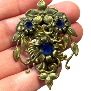 Antique brassy blue crystal flower antiqued fur clip